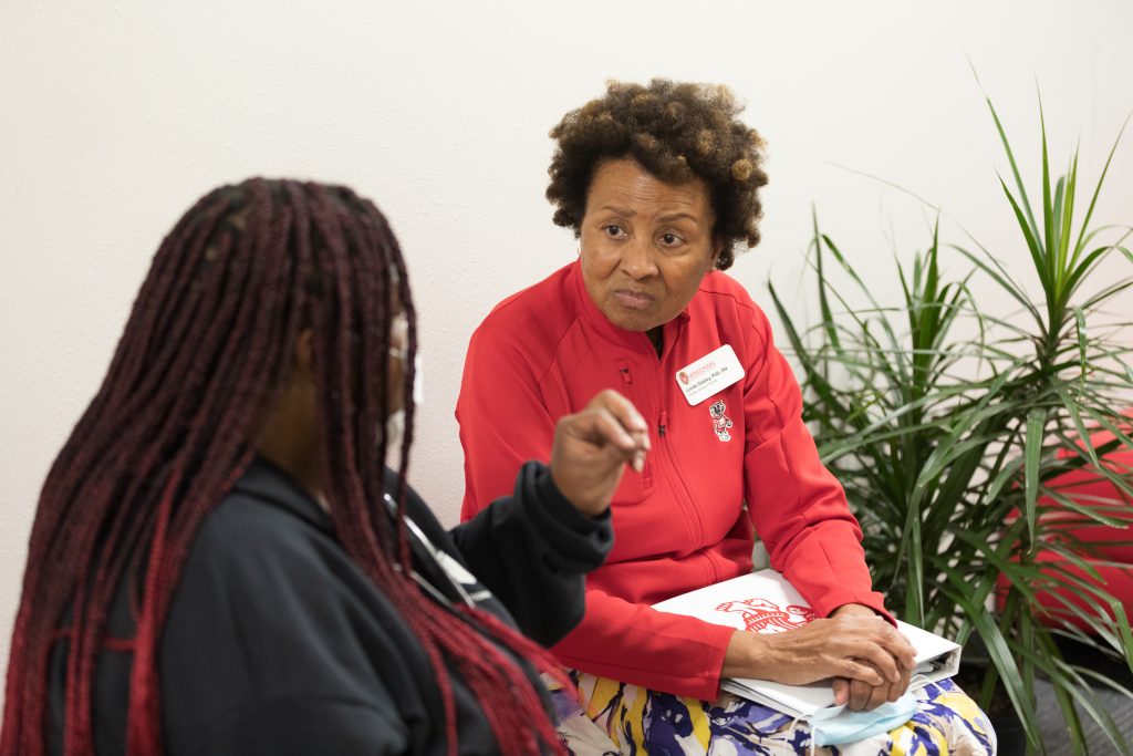 Dr. Linda Oakley meets with a patient at the UW South Madison Partnership