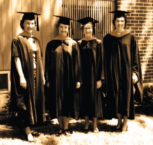 The first four students to receive graduate degrees, a master of science in pediatric nursing. From left to right: Catherine Slamar ’60, MS’66, Marie Bremer, MS’66, Karen Pridham ’57, MS’66, PhD ’72, and Carolyn Aradine, MS’66. Circa June 6, 1966 