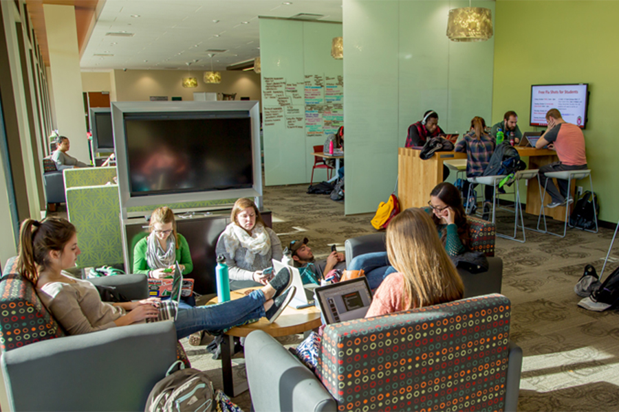 Students studying in Curran Commons.