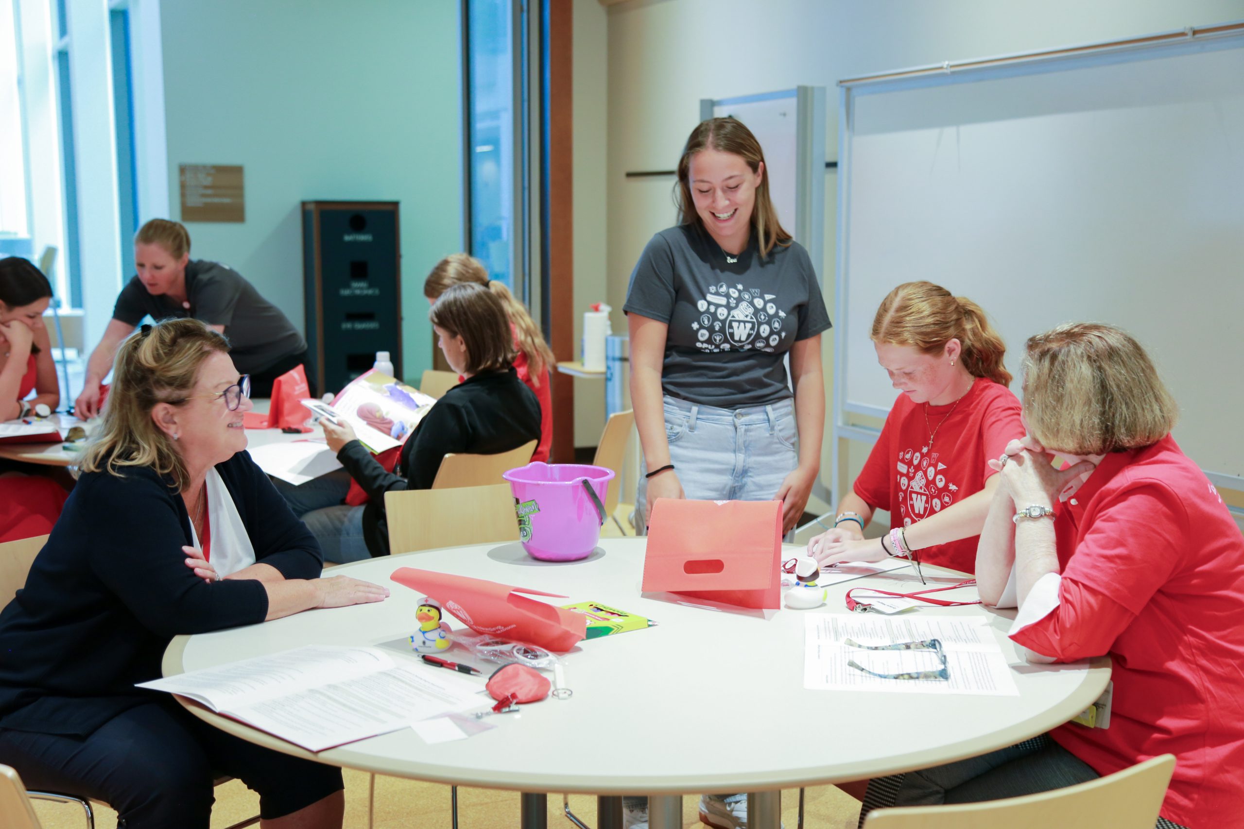 Attendees create their own name badges with the help from current nursing students.