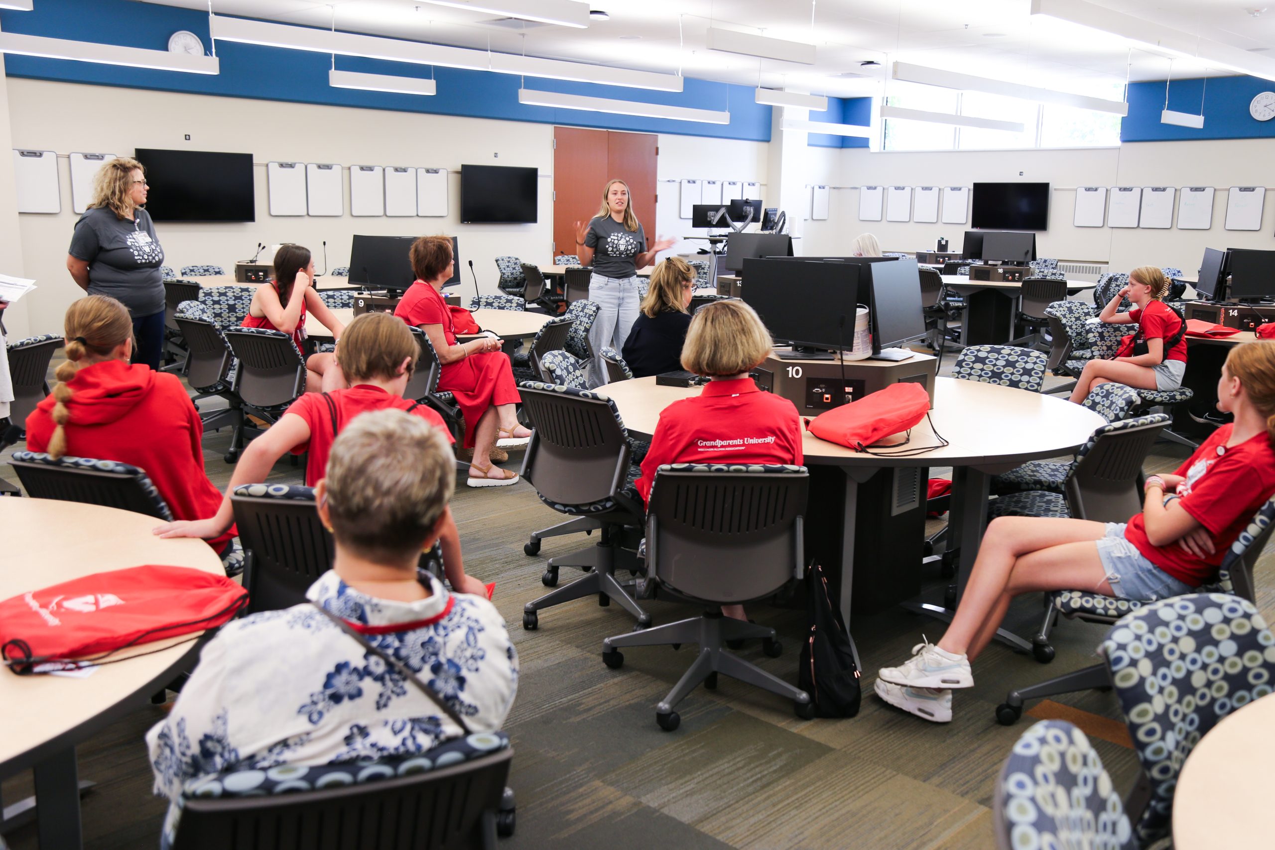 Participants at Grandparents University explore one of the active learning classrooms in Sigke Skott Cooper Hall.