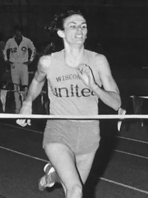 Cindy Bremser crosses the finish line