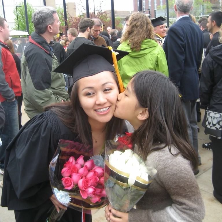 Sonam Dorjee kisses her aunt at her graduation from the School of Nursing in 2011.