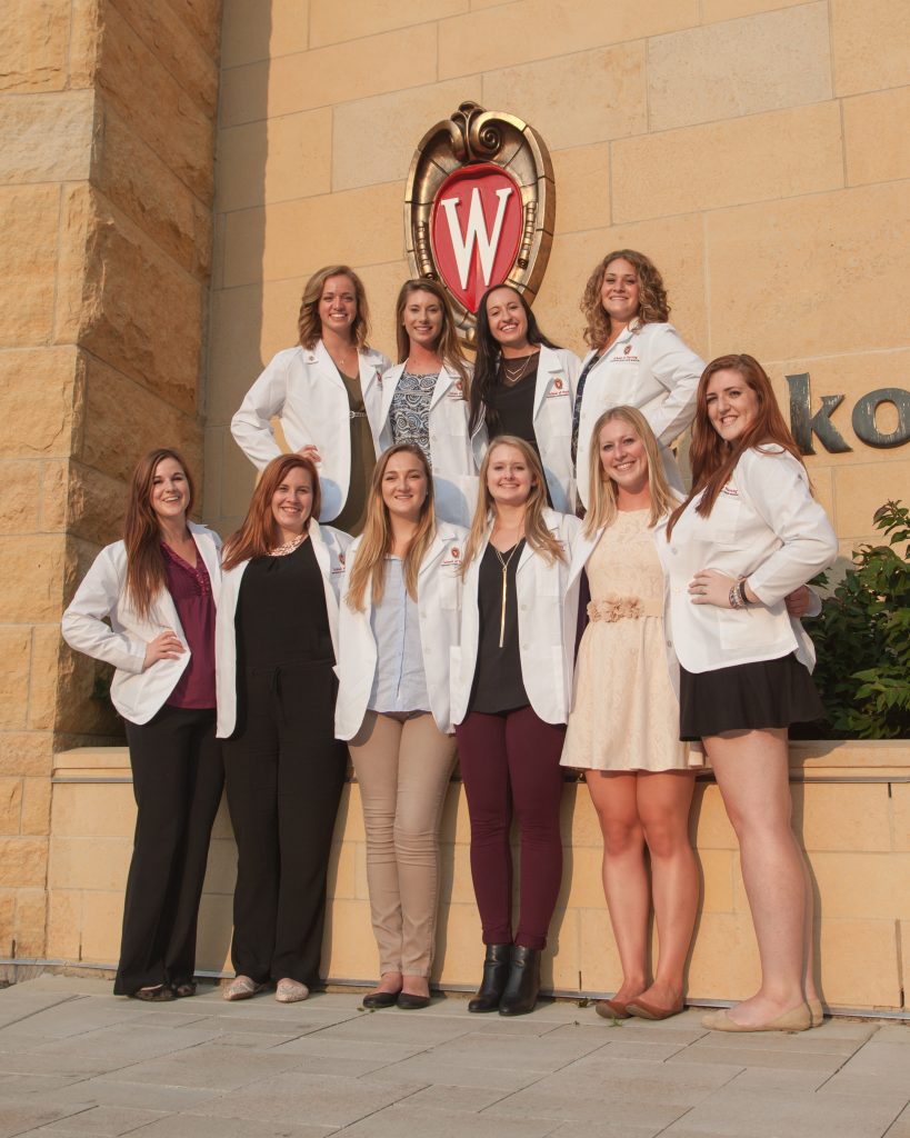 Traditional BSN students celebrate receiving their white coats at the first White Coat Ceremony.