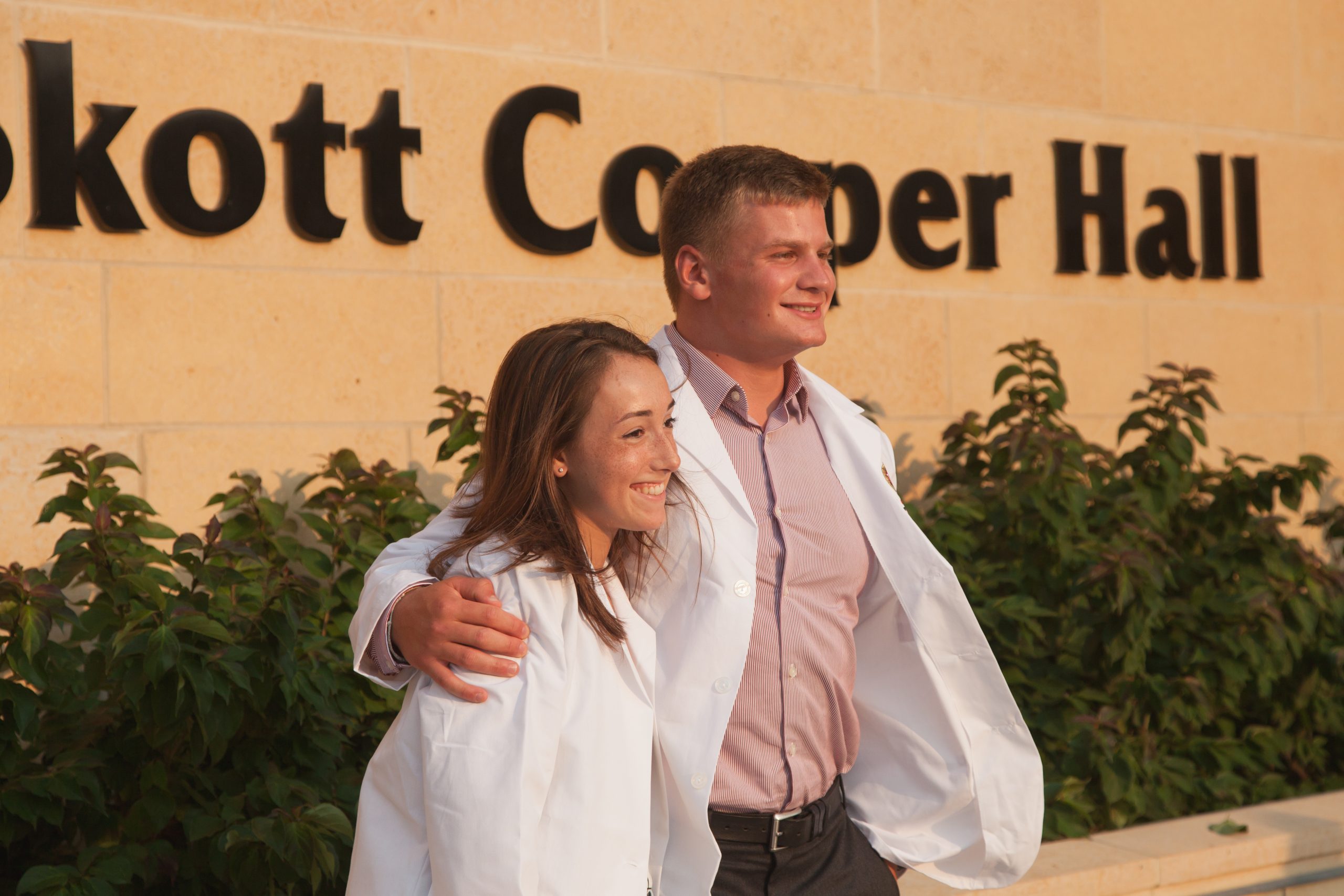 Traditional BSN students celebrate receiving their white coats at the first White Coat Ceremony.