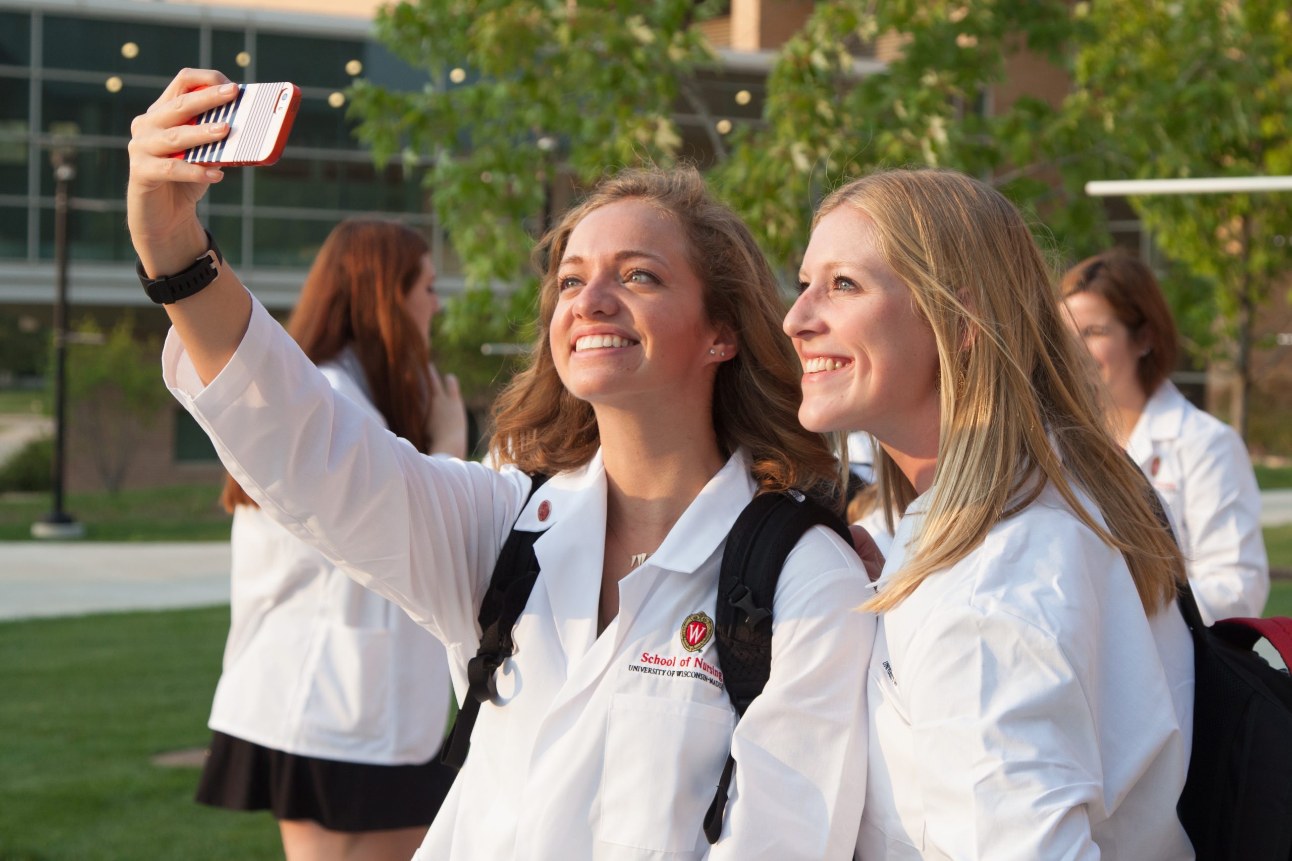 Traditional BSN students celebrate receiving their white coats at the first White Coat Ceremony.