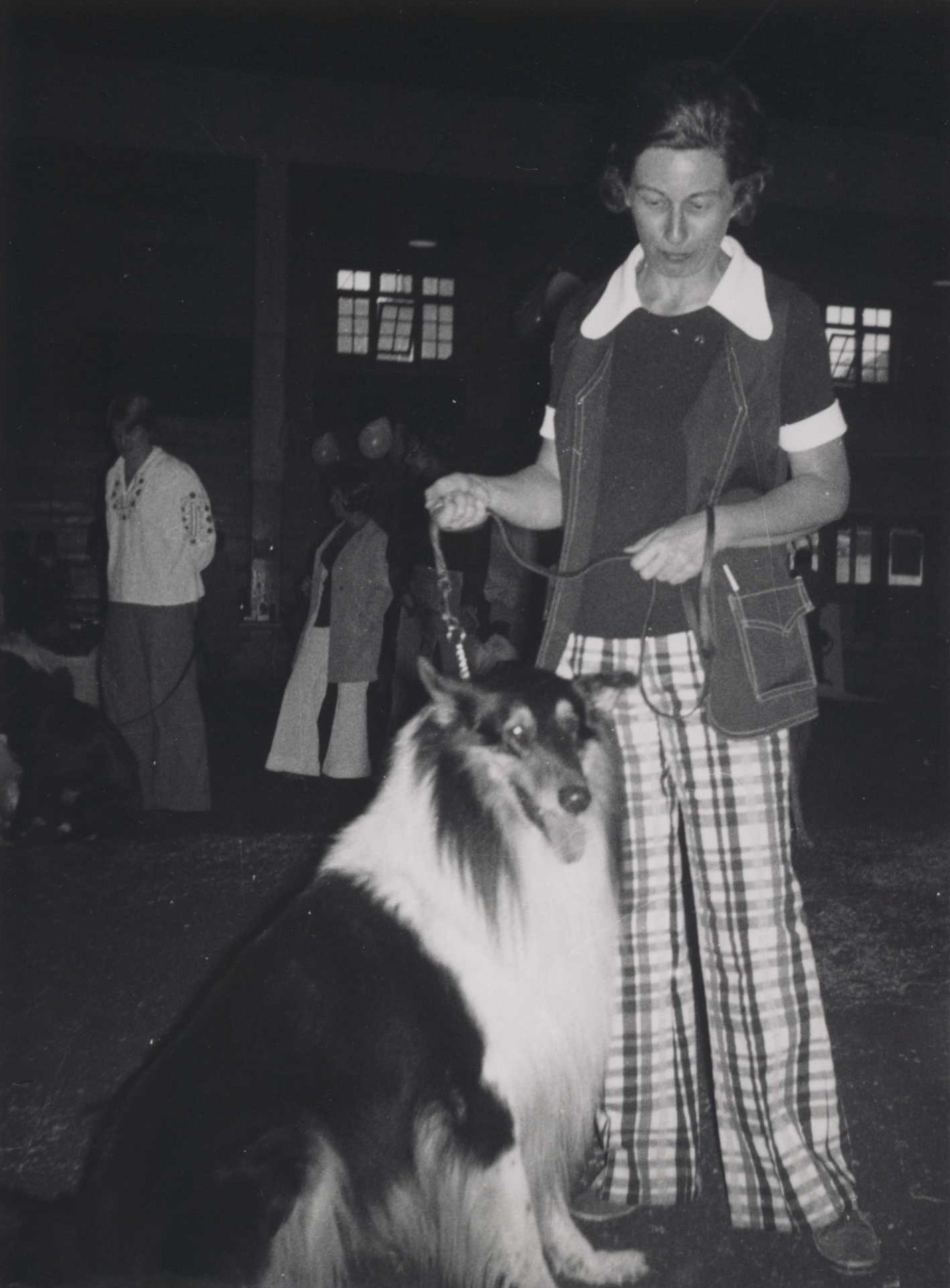 MacIntosh "Mac" Wellington Heath, the School of Nursing's unofficial mascot, sits with his owner Betty Johnson.