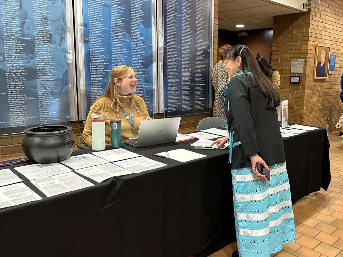 Attendees being greeted as they arrived at the summit.