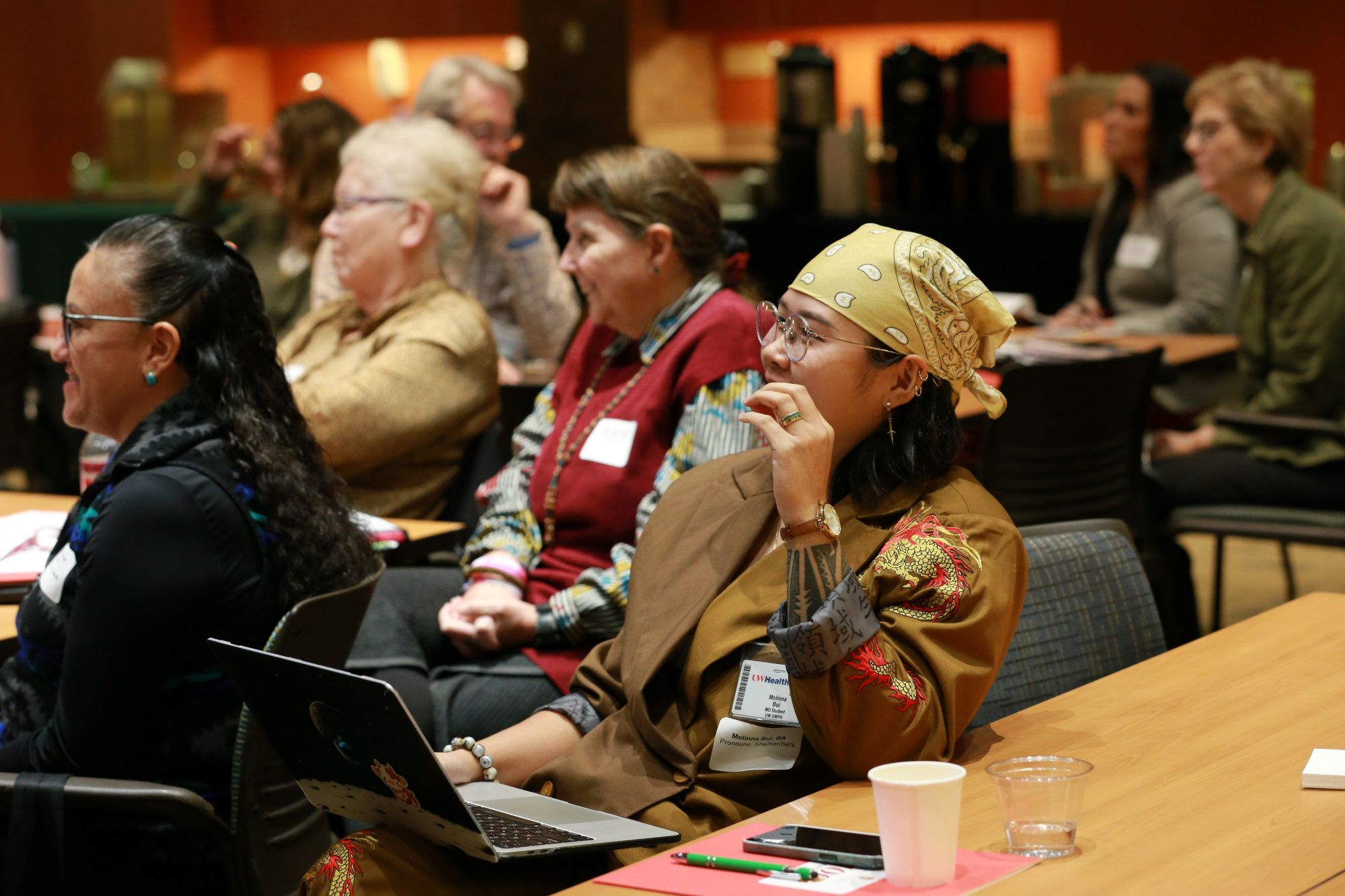 Participants enjoying the summit presentations.