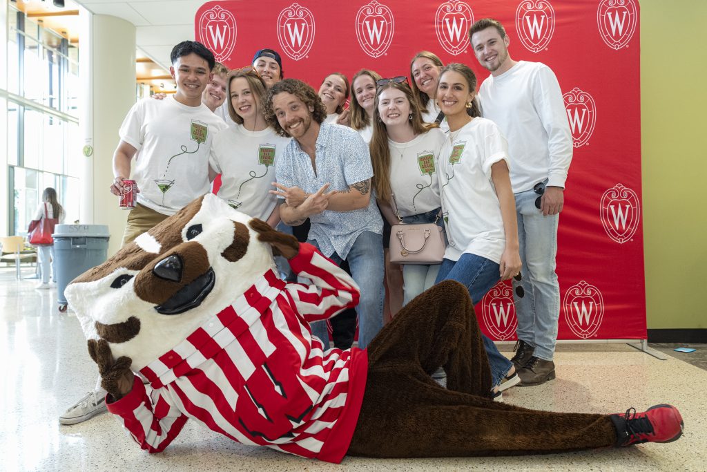 Graduating students pose with Buck at the 2024 student send off.