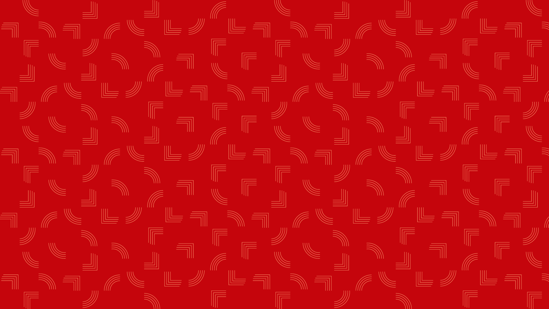 An orange pattern on a red background.