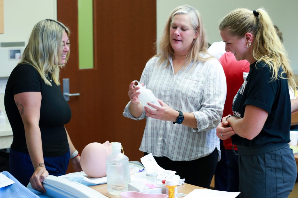 Students learn new techniques in a skills lab.