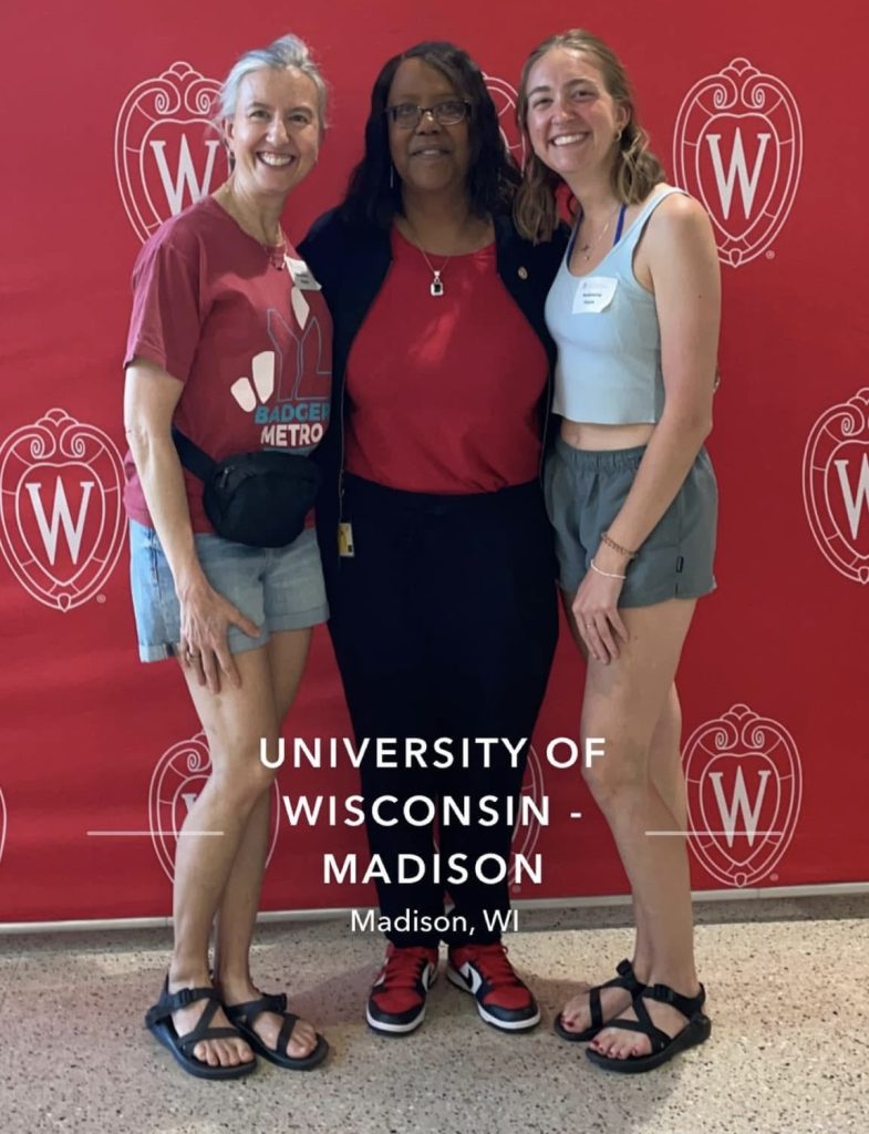 Dean Emerit Scott, Kimberley Bizjak ’93, and daughter