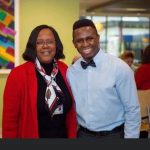 Linda D. Scott and Edriss Drammeh at his DNP graduation ceremony in 2020.