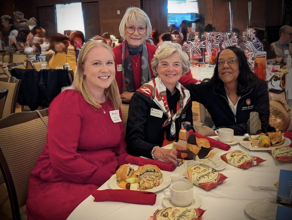 Emily Schumacher, Linda Scott, and colleagues at the Centennial celebration dinner.