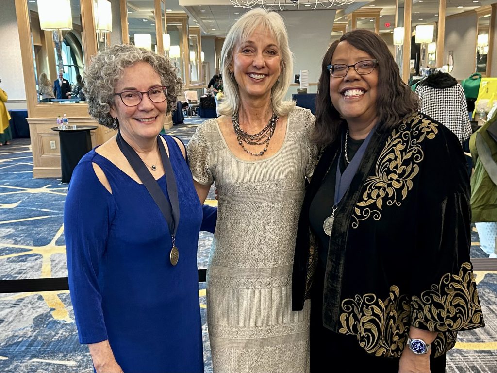 Dean Emerit Scott, Dr. Susan Zahner, and Dr. Teri Pipe at an event.