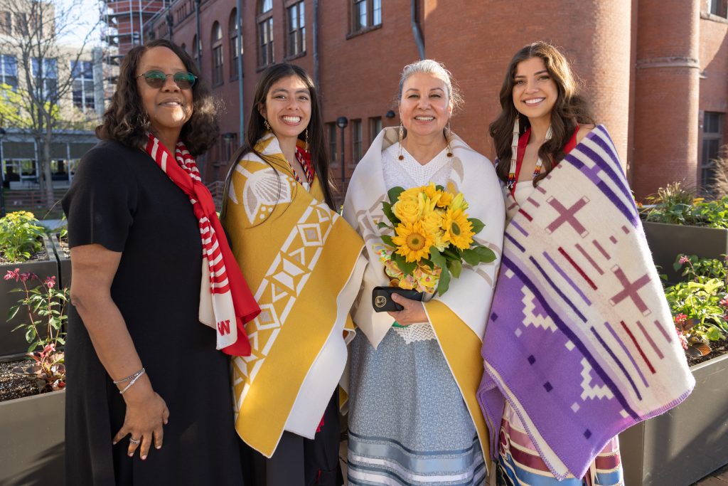 Linda D. Scott poses with Native American Center for Health Professions nursing graduates.