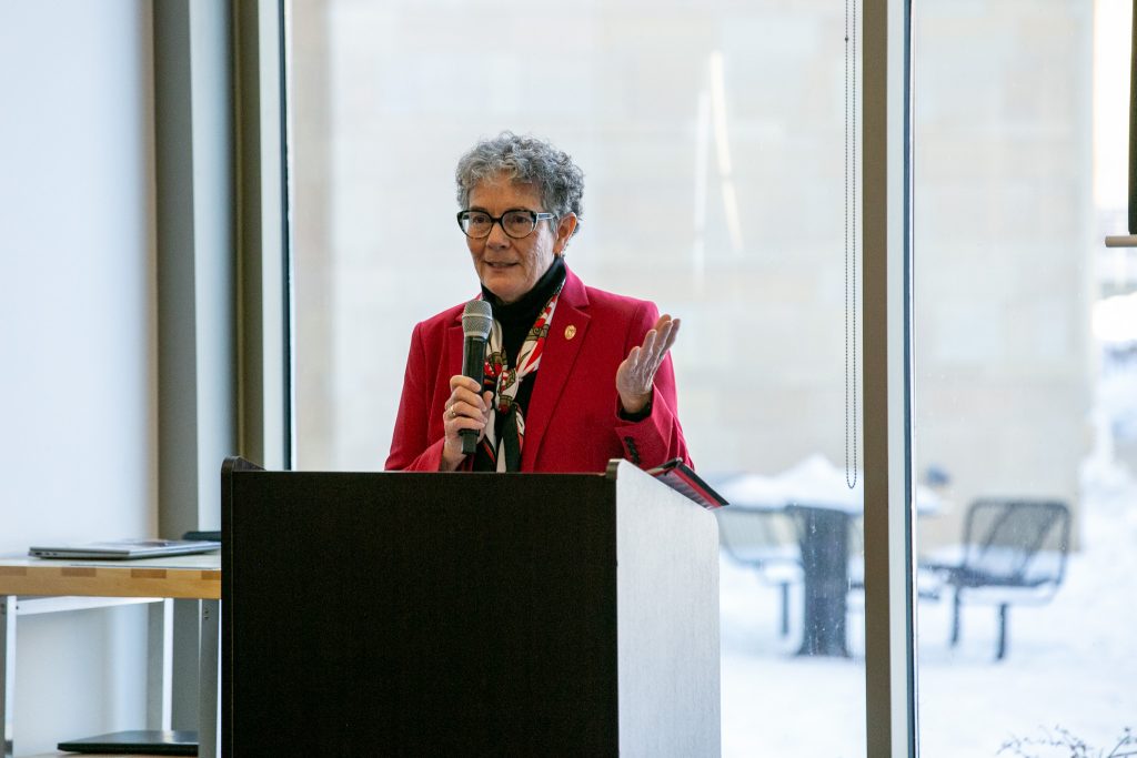Interim Dean Susan Zahner, DrPH, RN, FNAP, FAAN, congratulating the winter graduates.