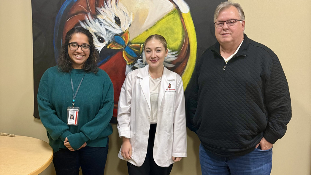Deaton (center), volunteering at the Potawatomi Health and Wellness Clinic in Crandon.