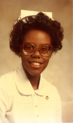 Dean Emerit Scott wears a white nursing uniform and cap during her undergraduate years at Michigan State University, circa 1975-1979. (Photo courtesy of Dean Emerit Scott)